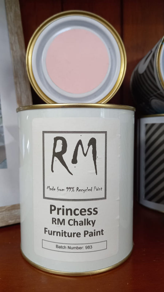 Can of Princess RM Chalky Furniture Paint with pink interior on a wooden surface